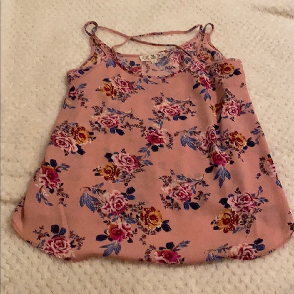 I am selling a pink rose size small tank top.